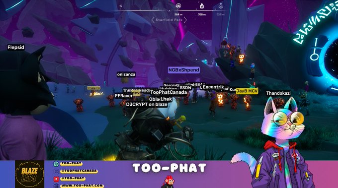 A video game screenshot from a multiplayer online game showing multiple player characters gathered in a purple-hued fantasy environment, with an animated cat avatar overlay labeled 'TOO-PHAT' and YouTube/social media handles.