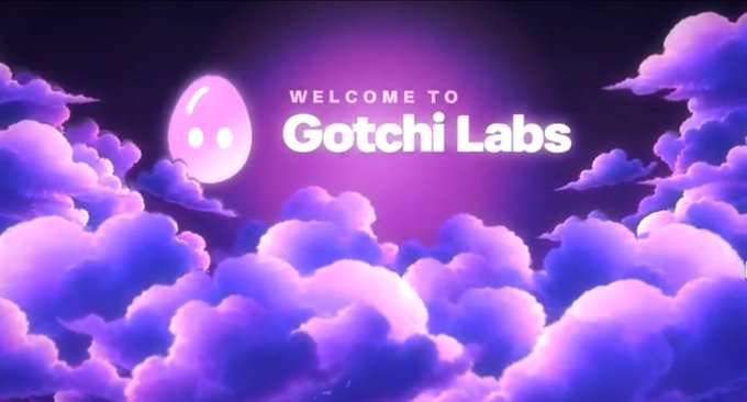 A promotional graphic displays the text 'Welcome to Gotchi Labs' against a backdrop of purple clouds with a small pink ghost-like character.