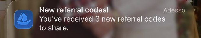 A notification from the Adesso app showing the message "New referral codes! You've received 3 new referral codes to share."