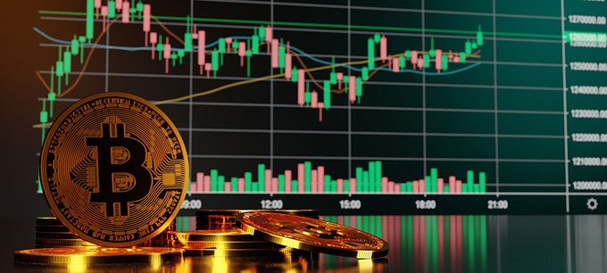 A gold Bitcoin coin sits in front of a candlestick chart showing price movements between 120,000 and 127,000, visually representing the crypto market's strong weekly performance highlighted by $853 million in Bitcoin ETF purchases.