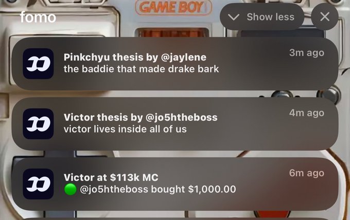 A 'fomo' notification overlay over a Game Boy background showing recent activity: 'Pinkchyu thesis by @jaylene — the baddie that made drake bark' (3m ago), 'Victor thesis by @jo5theboss — victor lives inside all of us' (4m ago), and 'Victor at $113k MC — @jo5theboss bought $1,000.00' (6m ago).