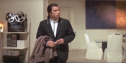 The image shows a man dressed in a suit standing in a room with white chairs, a table, and a record player. The man appears to be holding a jacket or coat over his shoulder while looking at something off-camera. The background features a painting on the wall that is blue and purple. The post includes information about NFTs & Chill coming back for another season in Hong Kong, London, and New York City starting from September 9th.