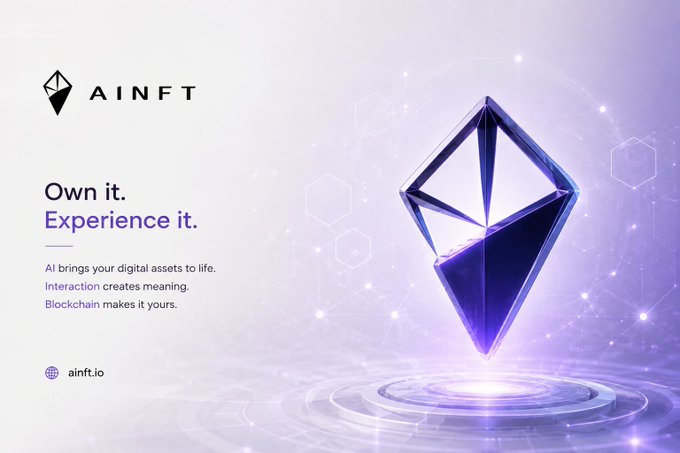 An AINFT promotional graphic with a purple geometric crystal/diamond, text reading 'AINFT', 'Own it. Experience it.', 'AI brings your digital assets to life. Interaction creates meaning. Blockchain makes it yours.', and 'ainft.io'.