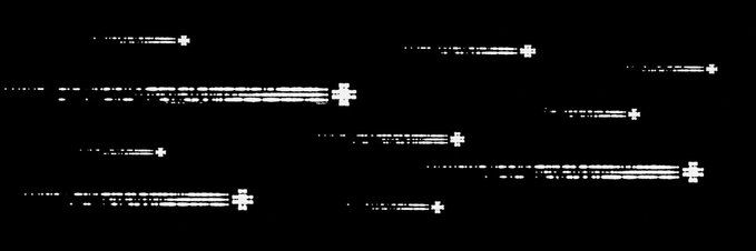 A black and white glitch-art image shows horizontal streaks of distorted text ending in cross symbols.