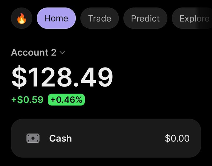 A mobile trading app interface in dark mode showing 'Account 2' with a balance of $128.49, up $0.59 (+0.46%), and a Cash balance of $0.00.