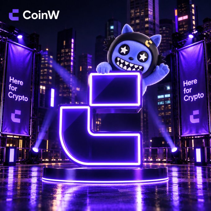 A blue CoinW mascot character with star eyes and a toothy grin perches atop a glowing purple "C" logo monument in a rainy, neon-lit cityscape, flanked by two banners reading "Here for Crypto." The image reinforces the "You know the name. You know the logo." caption by prominently displaying the brand's iconic purple "C" mark and CoinW wordmark, emphasizing instant brand recognition.