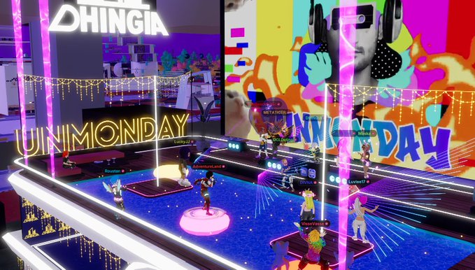 A vibrant 3D virtual environment with neon lights, displaying 'DHINGIA' and 'UNMONDAY' signs with multiple avatar characters scattered across a colorful platform.