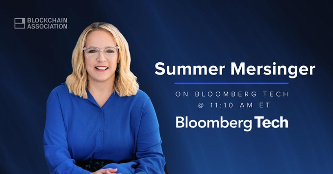 A promotional graphic for the 'BLOCKCHAIN ASSOCIATION' features a smiling blonde woman in a blue shirt, advertising an appearance by 'Summer Mersinger ON BLOOMBERG TECH @ 11:10 AM ET'.