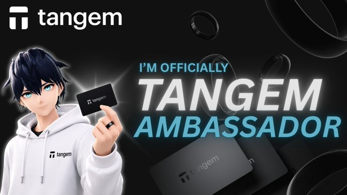 A Tangem advertisement featuring an anime-style character holding a Tangem card, with text reading 'I'M OFFICIALLY TANGEM AMBASSADOR'.