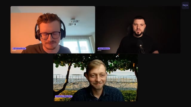 The image shows three men sitting at a table, each wearing headphones. They are all looking at the camera, possibly participating in an online meeting or video call. The background of the image features trees, suggesting that they might be in a park or a similar outdoor setting. The caption provided below the image provides information about traditional banking and how eCash (XEC) can help AI agents overcome bottlenecks by enabling frictionless transactions between parties.
