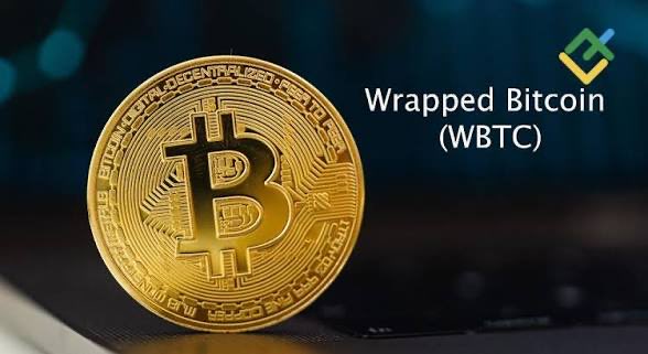 A promotional image features a gold Bitcoin coin on a laptop keyboard with the text 'Wrapped Bitcoin (WBTC)' and a logo in the upper right.