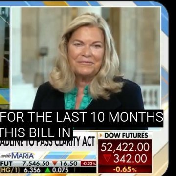 A news broadcast screenshot showing a blonde woman in a black blazer with text 'FOR THE LAST 10 MONTHS THIS BILL' and stock tickers including DOW FUTURES at 52,422.00 and FUT at 7,546.50.