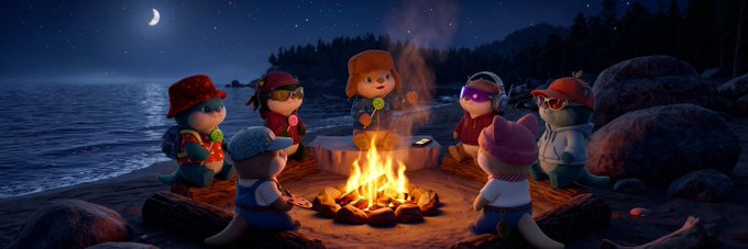 A group of six cartoon otters wearing colorful hats and outfits gather around a glowing campfire on a beach at night under a crescent moon. The image's cozy, collaborative vibe aligns with the post announcing a new partnership with @LostOttersRH, which highlights securing a collab and seeking whitelist opportunities.