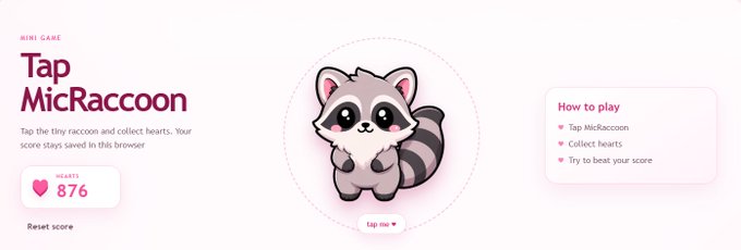 A 'Tap MicRaccoon' mini-game interface featuring a cartoon raccoon, a score of 876 hearts, and instructions to tap the raccoon and collect hearts.