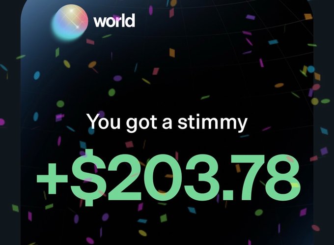 A celebratory World app notification displaying "You got a stimmy +$203.78" surrounded by colorful confetti, illustrating the poster's first trade reward from @world_xyz.