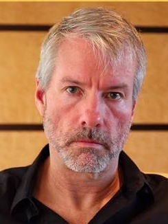 A close-up portrait of a serious-looking man with gray hair and a salt-and-pepper beard, identified as Michael Saylor in the accompanying post about Strategy's Bitcoin holdings remaining steady at 845,050 BTC.