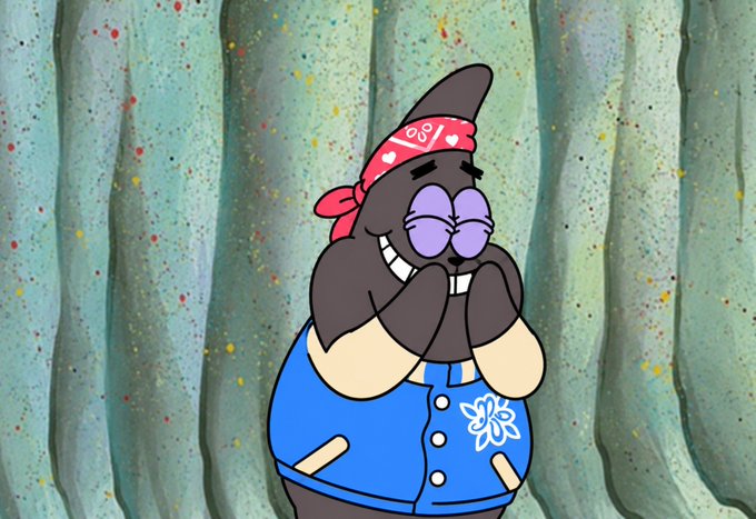 An animated cartoon groundhog character with purple eyelids and two front teeth stands against a green curtain background, wearing a blue jacket and a red bandana.