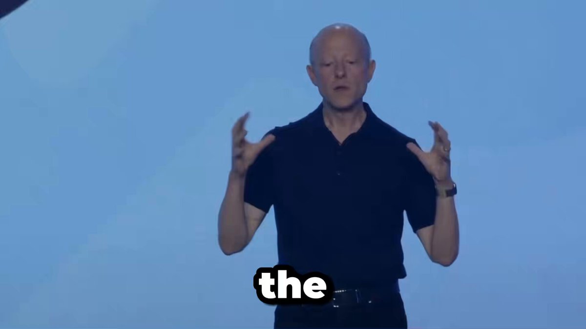 The image features an older man wearing a black shirt standing against a blue sky background. The caption of the image reads "the" with a block quote below, which suggests that this might be part of a larger conversation or discussion about a specific topic related to the post.