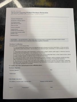 A close-up photograph of a printed document titled 'Advanced Computing Product Purchaser Declaration' containing fields for purchaser information and certification options.