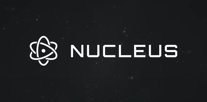 A dark, starry background featuring the white 'NUCLEUS' logo alongside an atom-like emblem, suggesting a blockchain or technology brand.
