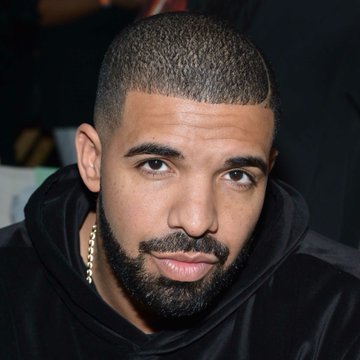 Drake looks on with a serious expression, reportedly after losing a $1.5 million USDT bet on Argentina to win the FIFA World Cup final against Spain.