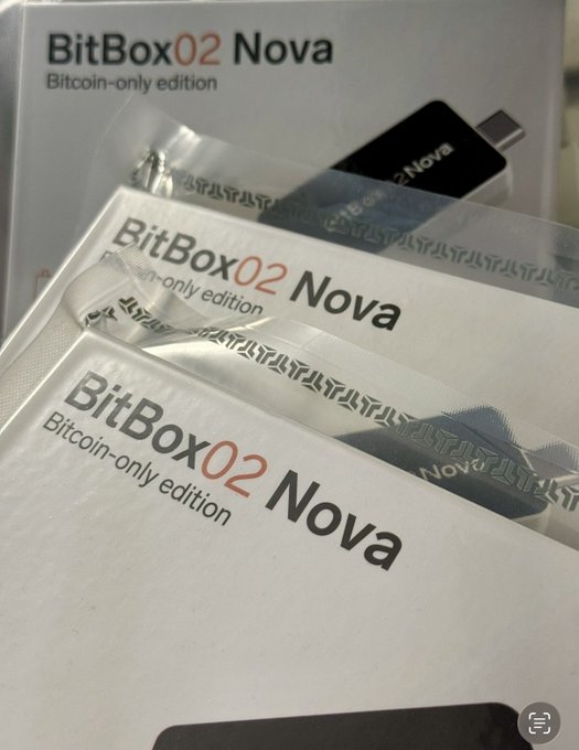 Close-up photograph of three retail packages for the 'BitBox02 Nova', labeled as the 'Bitcoin-only edition' hardware wallet.