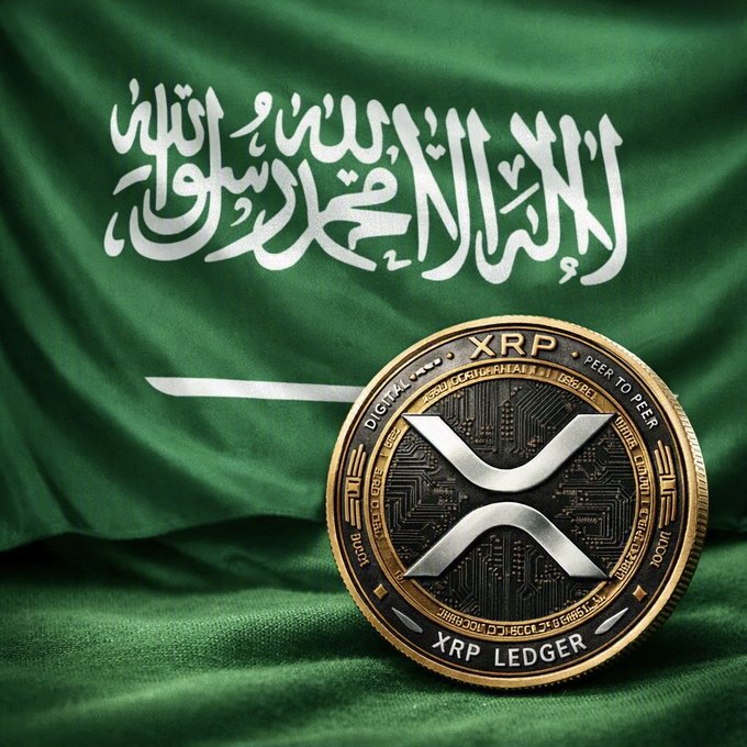 A physical XRP coin rests on the Saudi Arabian flag, featuring the text "XRP LEDGER," "PEER TO PEER," and the iconic X symbol. The image ties XRP to Saudi Arabia, echoing claims of a potential link between the cryptocurrency and the nation's central bank.
