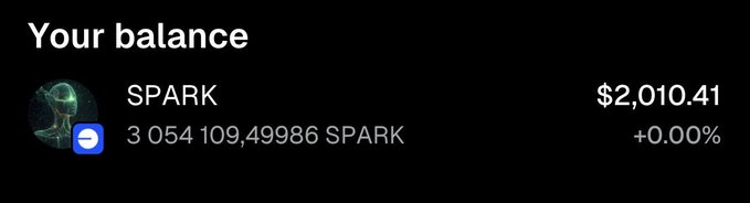 A dark screen displaying 'Your balance' for SPARK cryptocurrency showing $2,010.41 and 3,054,109,49986 SPARK tokens.