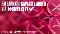 The image features a close-up of pink coins scattered across a dark background, with text that reads "5M EarnXRP Capacity Added Via XAMAN". The coins are arranged in various positions, creating an interesting visual effect. The text "UpShift" is also present on the image, which could be related to a social media platform or a cryptocurrency exchange where users can earn from their investments directly.