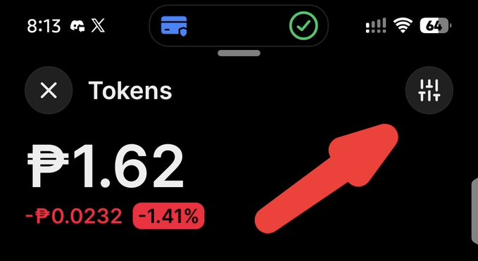 A mobile app screenshot showing a 'Tokens' section displaying '₱1.62' with a decline of '-₱0.0232 (-1.41%)' and a red arrow pointing to a filter icon.