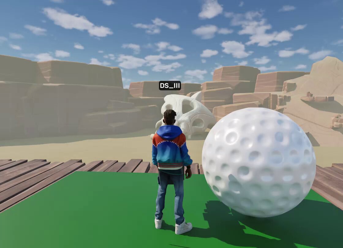 The image features a man standing next to a large white ball with a skull design on it. The man appears to be wearing a blue jacket, jeans, and a backpack. He seems to be looking at the ball or observing something else nearby. The background of the image is filled with sand and rocks, giving an impression that they are in a desert-like environment. There is also text present in the image, which reads "DSS.I. III".