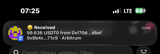 A smartphone notification showing a received transaction of 99.636 USDT0 from an address on the Arbitrum network, with the time at 07:25 and battery at 68%.