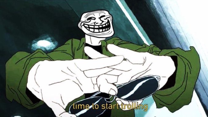 A trollface meme character wearing a green jacket gestures mischievously toward the viewer, with the caption "time to start trolling" displayed at the bottom. The image humorously ties into the post's playful reference to "$TROLL" during "SOLTEMBER," using the iconic trollface to embrace the meme culture around trolling.
