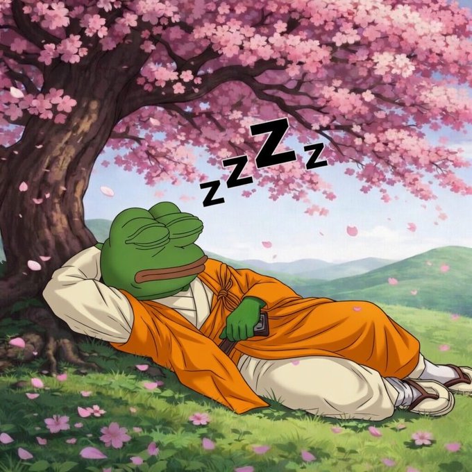 An anime-style illustration shows a green frog character wearing an orange robe and white garments, peacefully napping under a blooming cherry blossom tree with "zZz" symbols floating above its head.