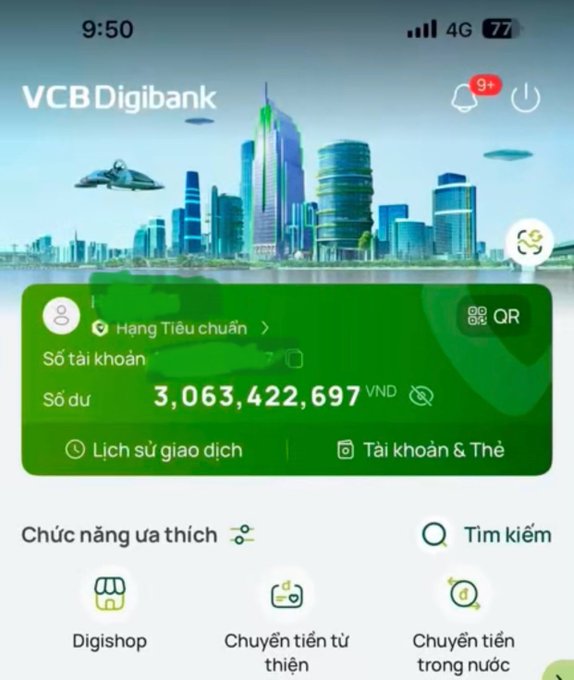 A smartphone screenshot displays the VCBDigibank app interface, showing an account balance of 3,063,422,697 VNĐ in a standard account tier.