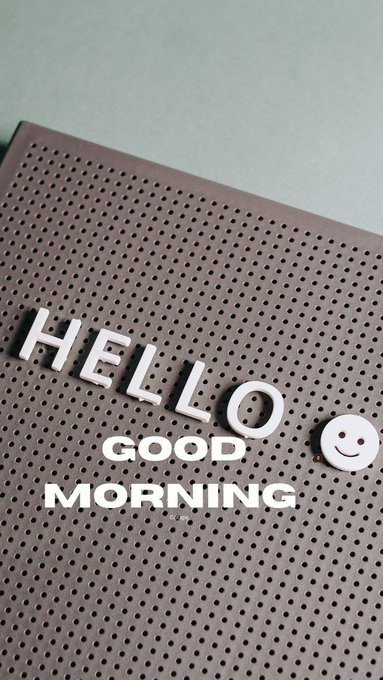 A pegboard displays white letters and a smiley face cutout that spell out 'HELLO GOOD MORNING.'