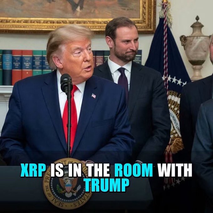 This image shows President Trump speaking at a podium, with text overlaid that reads "XRP IS IN THE ROOM WITH TRUMP," implying a connection to Brad Garlinghouse and the cryptocurrency $XRP.