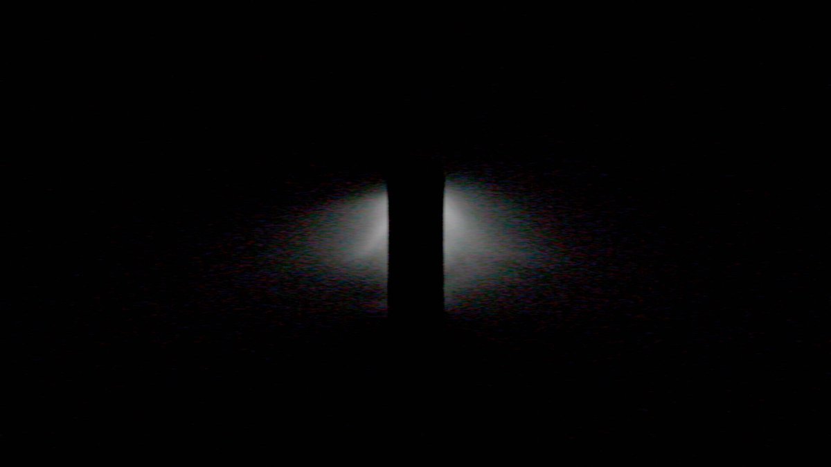 The image features a black background with a white light source, which appears to be a spotlight or a beam of light shining through an opening. The focus of the image is on this light source, drawing attention to its presence against the dark backdrop. The caption below the image reads "Rekt x Solana Introducing SOL Berry Friday 5th June". This suggests that the image was taken during the Solana Festival or a similar event and features a spotlight highlighting the Solana Berry product.