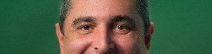 A close-up image of a man's eyes and forehead against a green background. The post mentions a dream of half a million dollars on @Pumpfun and an upcoming airdrop on Monday, suggesting the man in the image might be associated with this or the $TOAD cryptocurrency.