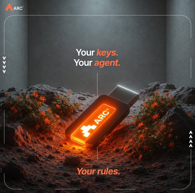 A glowing orange USB-style ARC key rests on a rocky, lunar-looking surface surrounded by small flowers, illuminated against a dark backdrop with the text "Your keys. Your agent." above and "Your rules." below. The image visually embodies the post's theme of decentralized compute power, with the luminous key symbolizing user control over onchain AI agent training resources.