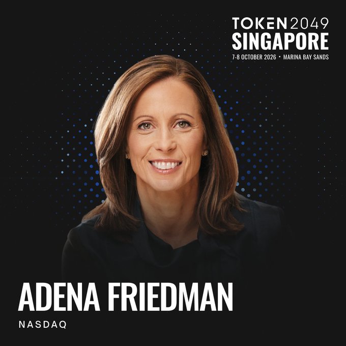 The image is a promotional graphic for TOKEN2049 Singapore (7-8 October 2026 at Marina Bay Sands) featuring Adena Friedman, CEO of NASDAQ, shown smiling against a dark blue background with the NASDAQ ticker displayed beneath her name. The graphic ties to the announcement that she will speak at TOKEN2049 about Nasdaq's legacy of market innovation, including its milestone as the first major U.S. exchange approved for tokenized securities trading.