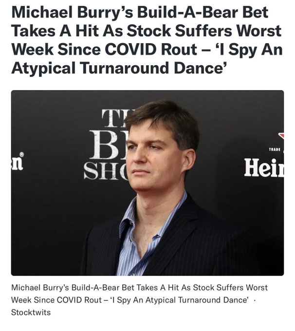 A news article headline reading 'Michael Burry's Build-A-Bear Bet Takes A Hit As Stock Suffers Worst Week Since COVID Rout – I Spy An Atypical Turnaround Dance' with a photo of Michael Burry at what appears to be 'The Big Short' premiere.