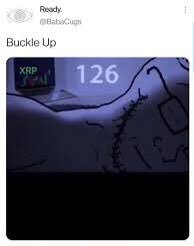 A digital post reads "Buckle Up" above an image showing the number "126" next to an "XRP" logo on what appears to be a shaded landscape, suggesting an upcoming price target or milestone for the XRP cryptocurrency.