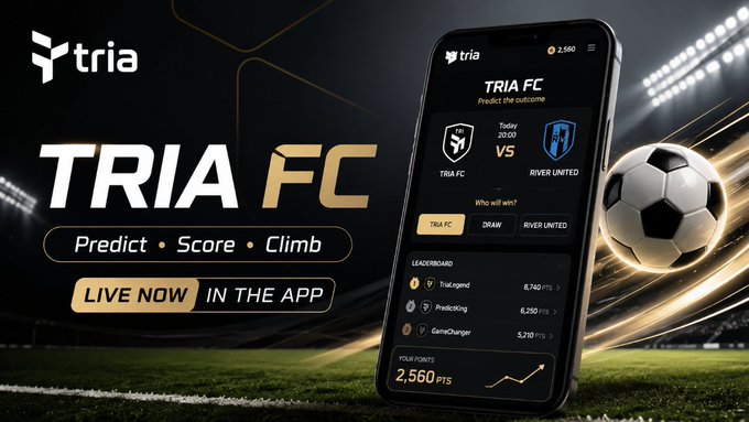The image features a smartphone displaying an app called "Tria FC", which is related to soccer. The phone screen shows a soccer ball, with text that reads "Prediction + Score + Climb" and "Live now in the app". This suggests that users can predict match outcomes, score points for their favorite teams or players, and climb up the leaderboard of popular soccer games like the World Cup.