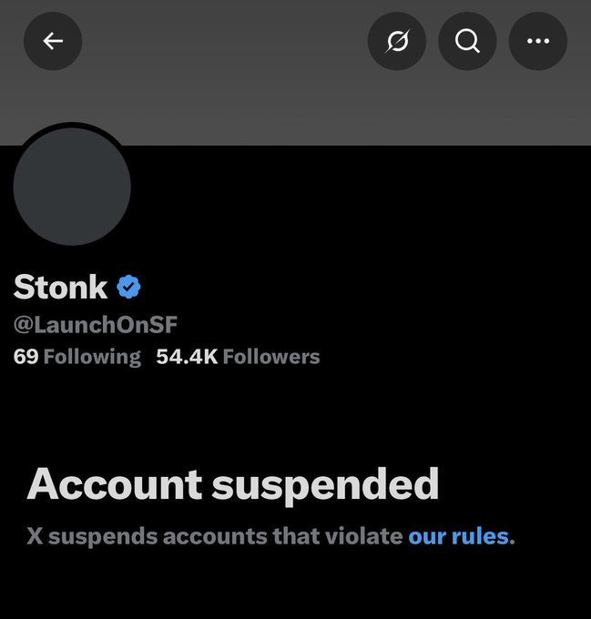 The image shows the suspended Twitter/X account "Stonk" (@LaunchOnSF) with 54.4K followers, displaying an "Account suspended" notice. This relates to the $STONK memecoin's struggles, as the token's official social media presence has been taken down amid its ongoing troubles.
