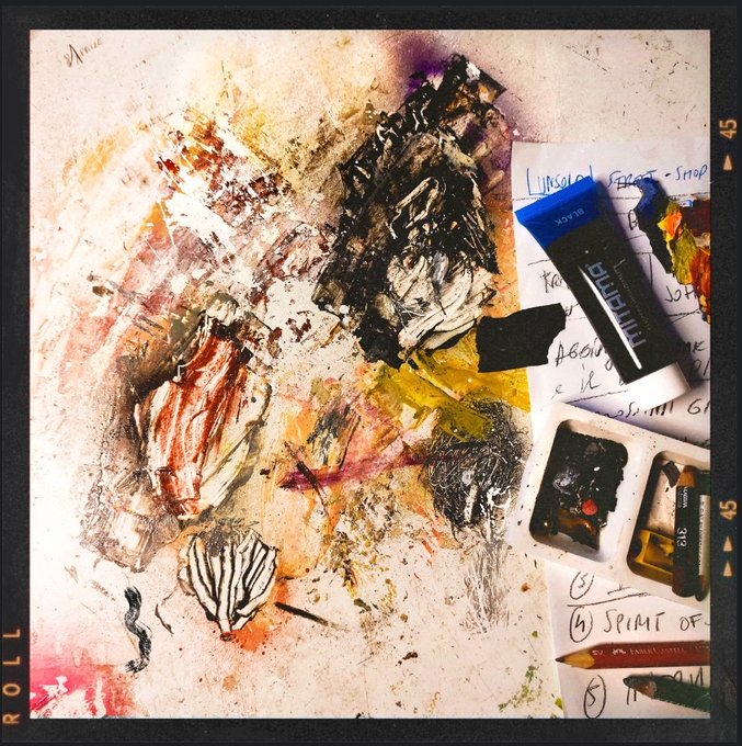 An artistic mixed-media piece resembling a film negative or artistic photograph showing painting supplies including a 'Liquitex' paint tube, brushes, and handwritten notes.