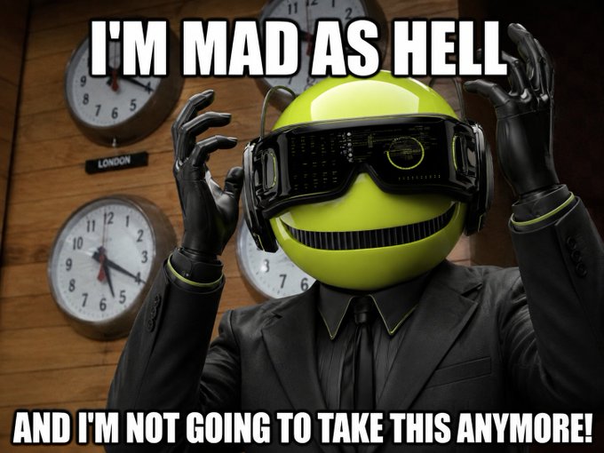 A meme featuring a person in a black suit wearing a yellow smiley face mask and VR goggles, with the text "I'M MAD AS HELL... AND I'M NOT GOING TO TAKE THIS ANYMORE!"
