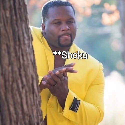 A man in a yellow hoodie stands near a tree with the text "**Shoku" overlaid on the image.