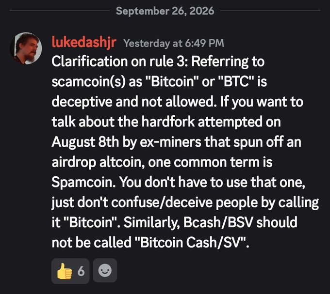 A Discord message from user "lukedashjr" on September 26, 2026 clarifies subreddit Rule 3, stating that referring to scamcoins as "Bitcoin" or "BTC" is deceptive and not allowed, and instructs users not to call Bcash/BSV "Bitcoin Cash/SV," instead suggesting the term "Spamcoin" for the August 8th hardfork altcoin.

This relates to the accompanying post, which satirically depicts the frustration of a Bitcoin user ("BLAKE2b" referring to Bitcoin's mining algorithm) waking up to new moderator decrees that enforce strict terminology rules, requiring confession for the sin of simply calling Bitcoin by its name.