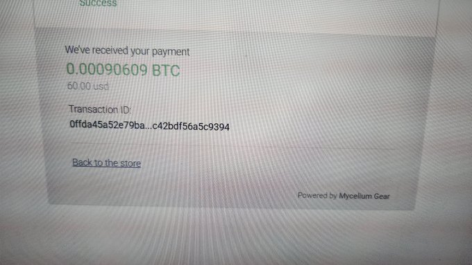 Screenshot of a successful Bitcoin payment confirmation showing 0.00090609 BTC ($50.00 USD) with transaction ID 0ffda45a52e79ba...c42bdf56a5c9394, powered by Mycelium Gear.